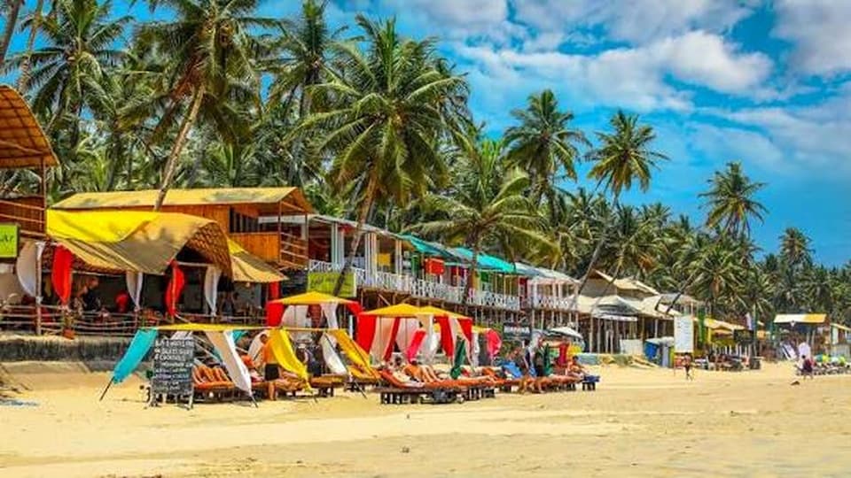 Vibrant Goa Beach Shacks with Colorful Canopies and Palm Trees